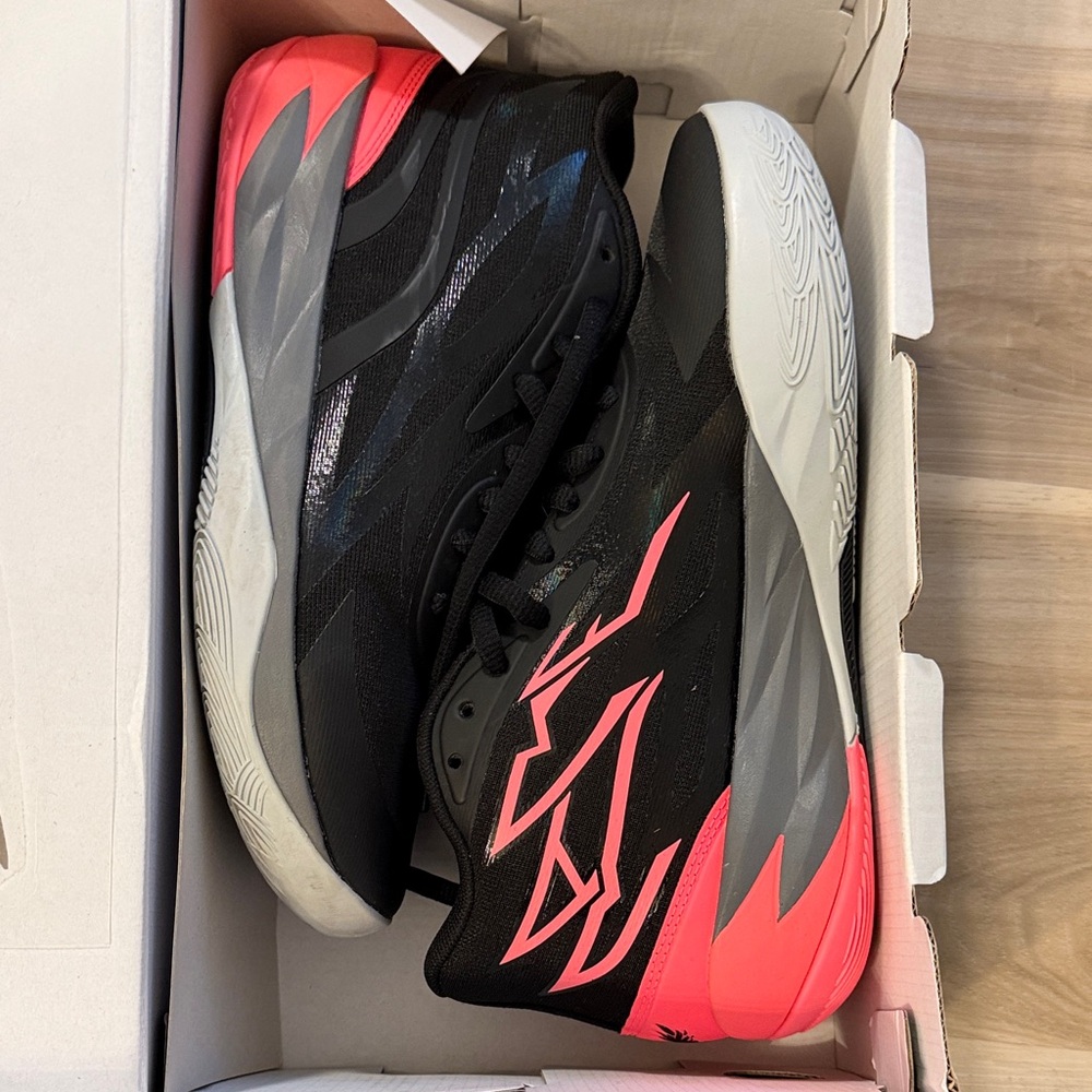 Puma Black and Sunset Glow Sneakers